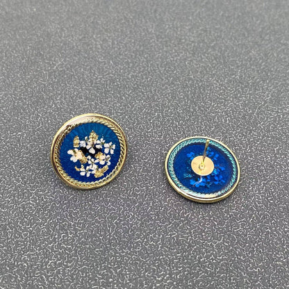 Clous d’oreilles fleuris Bleu céleste