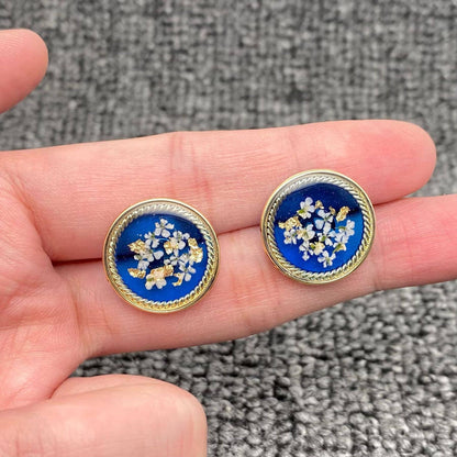 Clous d’oreilles fleuris Bleu céleste
